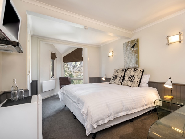 a cosy bedroom at Pure Chalet Thredbo