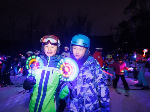 two kids posing for a photo at The Kids Flare Run in Thredbo