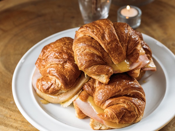 a plate of croissants at The Bakery in the Village Square