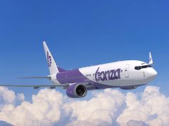 Bonza Airline plane in the sky