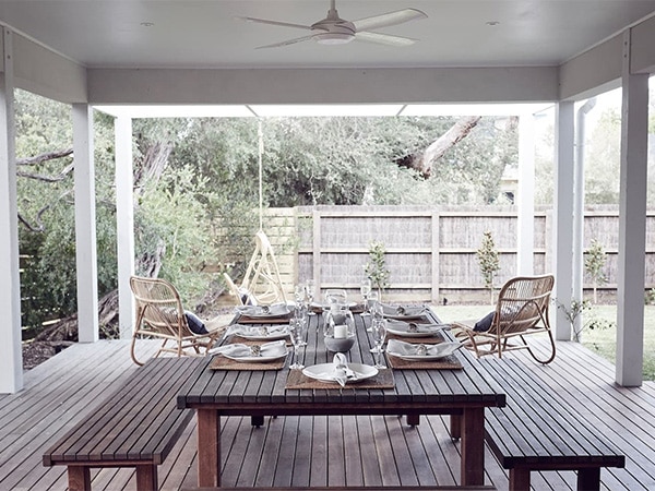 Verandah Beach House outdoor table setting.