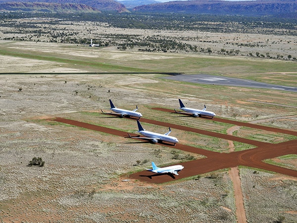 Aircrafts on field of Alice Springs airport.