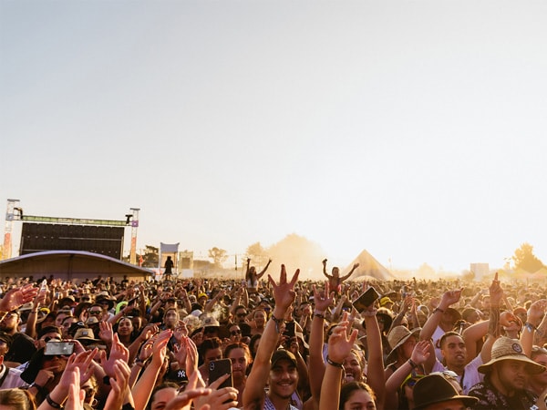 A festival with people dancing.