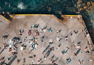 Socially distanced sunbathers near Clovelly in Sydney