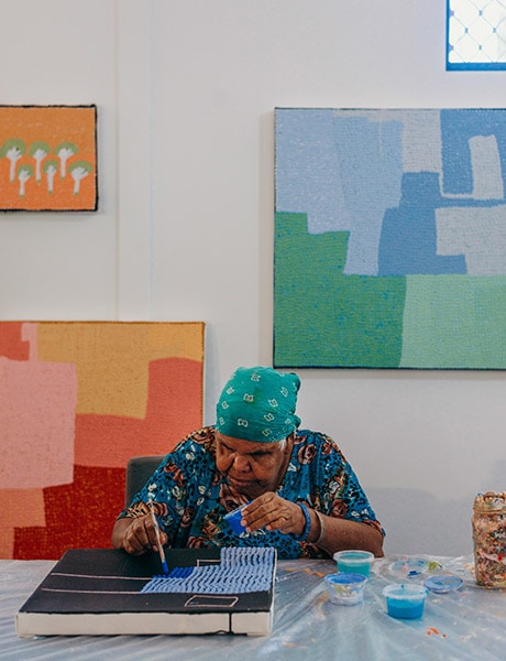 Maggie Green painting at Spinifex Hill Studio Port Hedland, Darwin City, Australia
