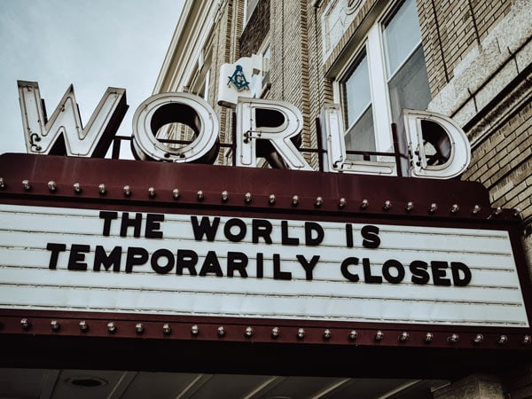 Sign reads world temporarily closed