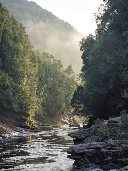 The sun reflects off the Franklin River and its many rock formations