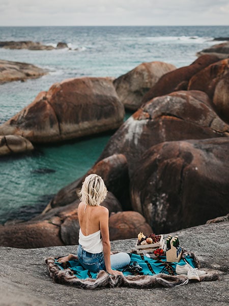 Girl on top of the rocks, Elephant rocks, Western Australia
