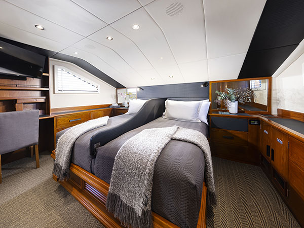 VIP stateroom with bed divider, Phoenix One Superyacht, the Kimberleys and NT, Australia