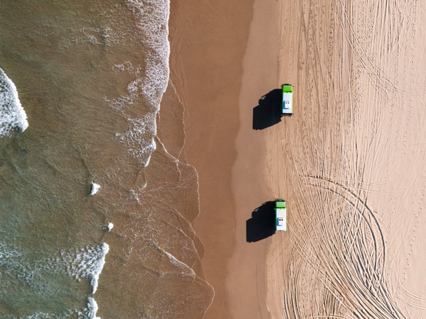 an aerial view of 4WD on the beach, Stockton Sand Dunes