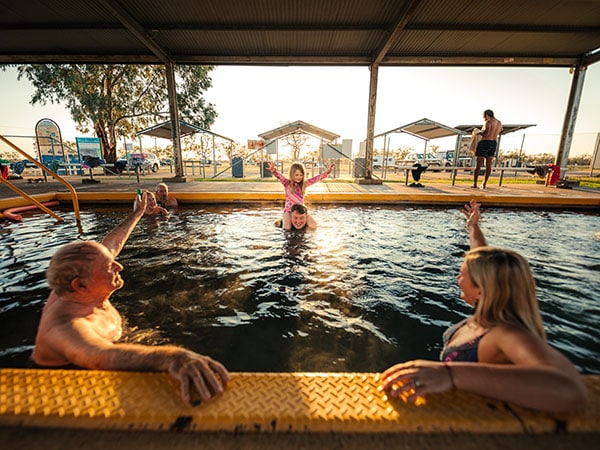 Family swimming, Pilliga Bore Bath, Narrabri, Australia
