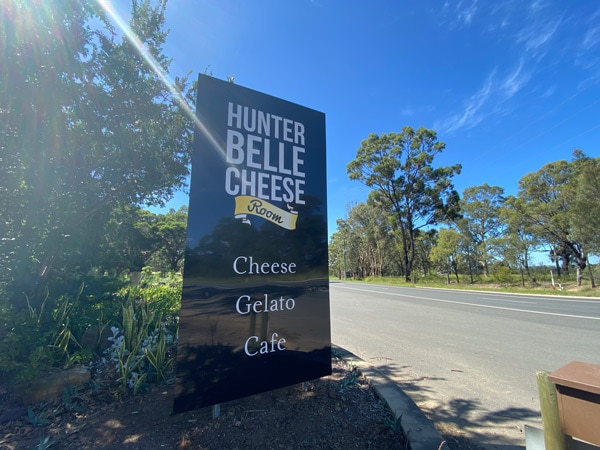 Hunter Belle Cheese sign along the road