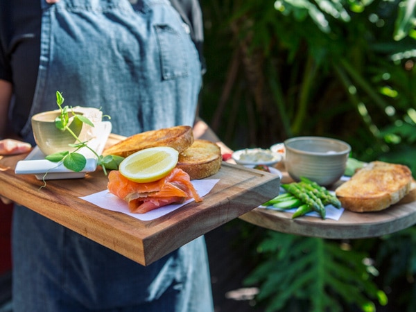 a person holding food at Cafe Enzo, Hunter Valley