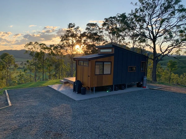 the Rosebook Eco Tiny Home at sunset