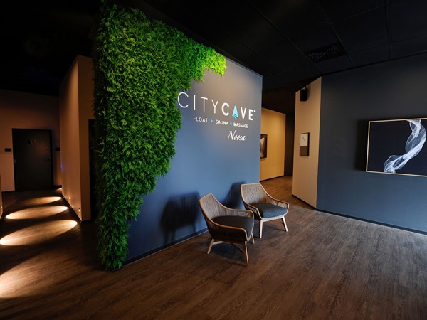 a signage of City Cave Noosa inside the spa