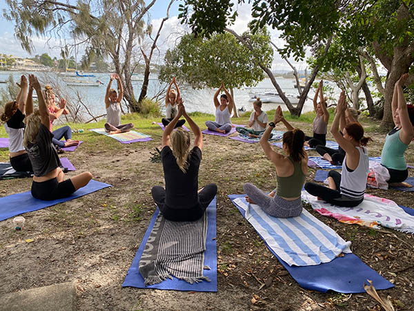 Women doing yoga, Noosa Yoga, Queensland, Australia