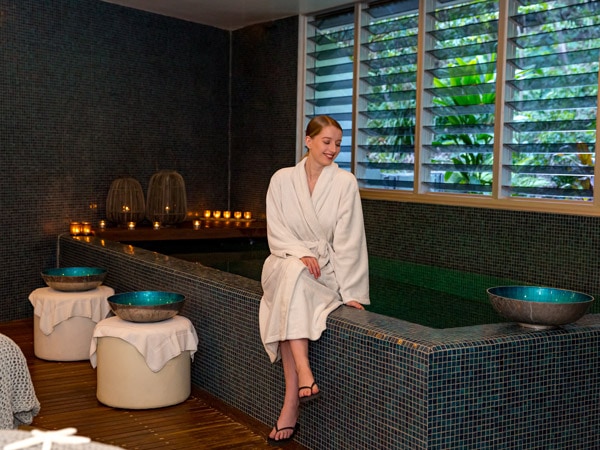 a woman wearing her bathrobe at Stephanies Ocean Spa