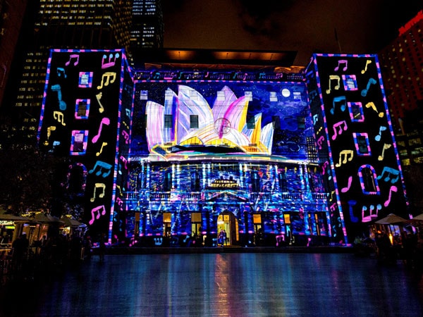 Ken Done's installation lights up Customs House in Sydney during Vivid