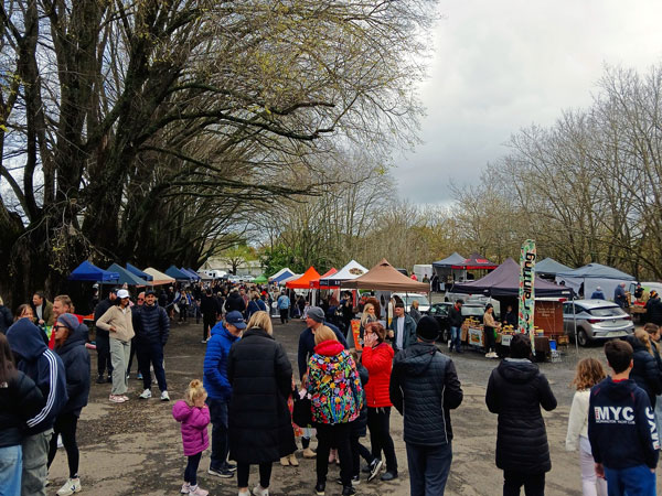 market stalls filled with people at Daylesford Sunday Market