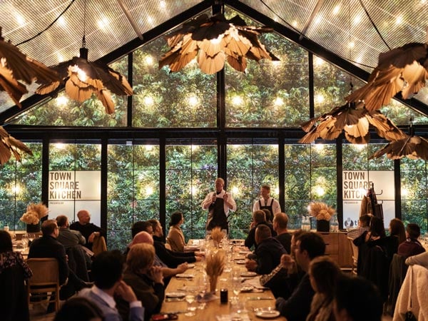 Two chefs talk to a room full of diners at Tasting Australia in Adelaide. (Image: South Australian Tourism Commission)
