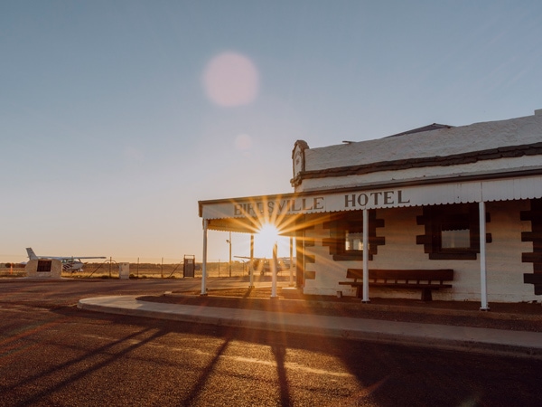 A sunset shot of the Birdsville Hotel. (Image: Tourism and Events Queensland/Hayley Williamson Photography)