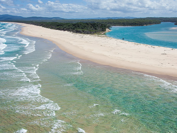Coastal aerial of Gaagal Wanggaan (South Beach) National Park in Scotts Head, south of Nambucca Heads.