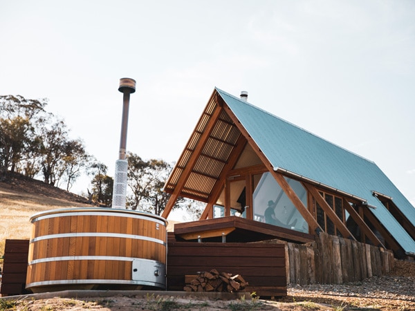 a wood-fired hot tub outside the Sweeney's Eco Hut on Kimo Estate, Nangus near Gundagai.