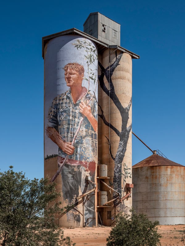 Fintan Magee painted Nick “Noodle” Hulland on the Patchewollock silo. (Image: Visit Victoria/Anne Morely)
