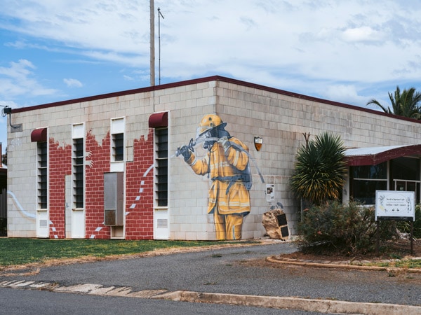 A mural of a firefighter on the Rupanyup old shire office building by Melbourne street artist Georgia Goodie. (Image: Visit Victoria/Anne Morely)