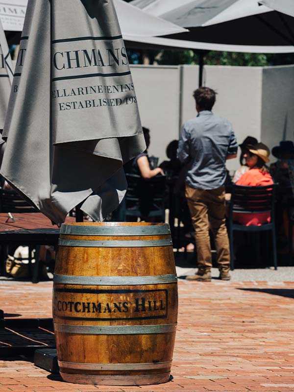 Scotchmans Hill Umbrella and barrel on terrace, Geelong, VIC, Australia