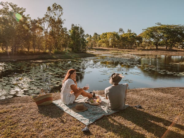 a couple enjoying a picnic at TYTO Wetlands