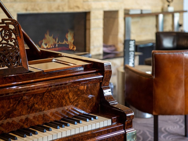 A piano inside The Barn Steakhouse. (Image: The Barn Steakhouse)