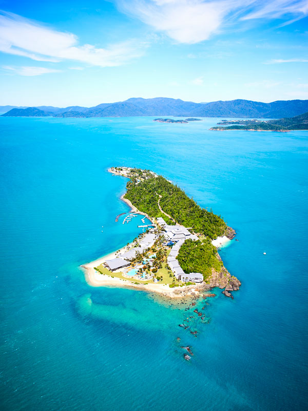 An aerial shot of Daydream Island. (Image: Tourism and Events Queensland)