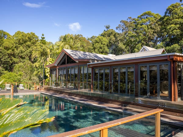 Take a swim in the heated infinity edge lap pool at Gwinganna Lifestyle Retreat. (Image: Tourism and Events Queensland)