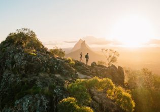 A view of the sun rising or setting over Mount Ngungun in the Sunshine Coast. (Image: Visit Sunshine Coast)