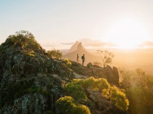 A view of the sun rising or setting over Mount Ngungun in the Sunshine Coast. (Image: Visit Sunshine Coast)