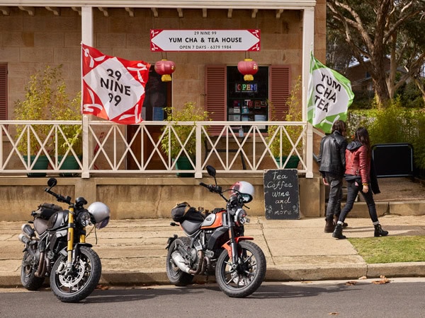 motorcycles parked outside the entrance of 29 nine 99 Yum Cha and Tea House, Rylstone