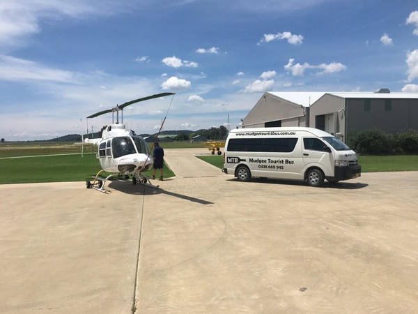 a helicopter and van for wine tour, Mudgee Tourist Bus