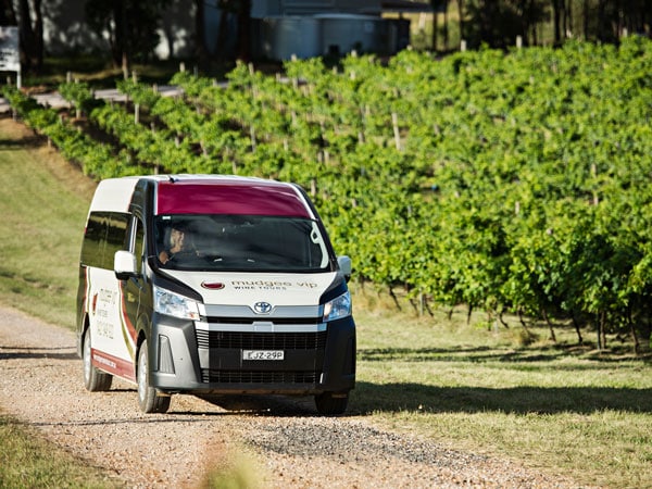 a van driving along a vineyard, Mudgee VIP Wine Tours