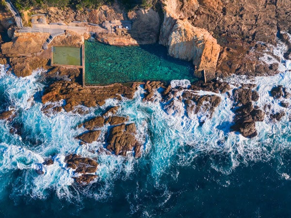 an aerial view of the Blue Pool along the Bermaguicoastline