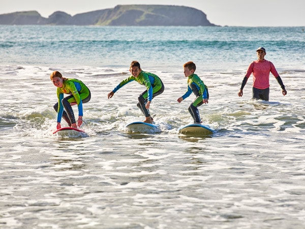 kids learning how to surf at Broulee Surf School, Batemans Bay