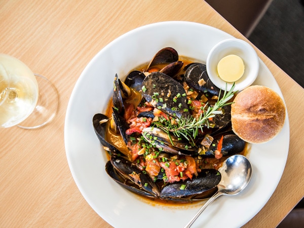 a plate of mussels on the table at Merimbula Aquarium andWharf Restaurant