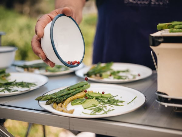 arranging foraged finds on plates at Sirocco South Forage and Feast