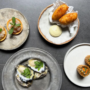 Plates of food at Dier Makr restaurant in Hobart.