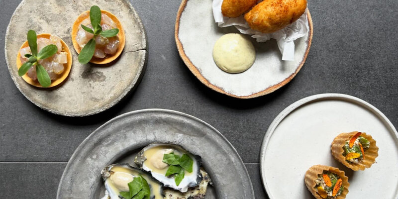 Plates of food at Dier Makr restaurant in Hobart.