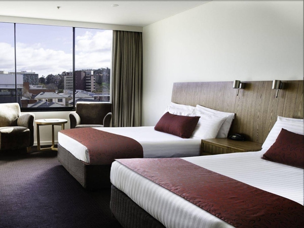 Bedroom interiors of the Hotel Grand Chancellor in Hobart, Tasmania, Australia