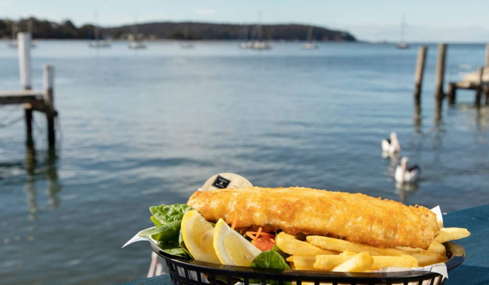 A basket of fish and chips served on the Merinda Cruises in Batemans Bay, NSW, Australia
