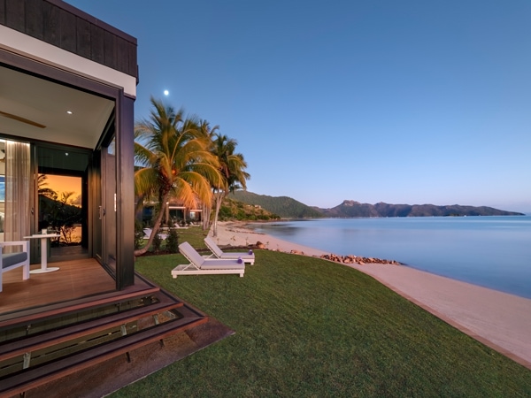 The InterContinental's Hayman Island Resort pavilion's beachfront exterior at sunset