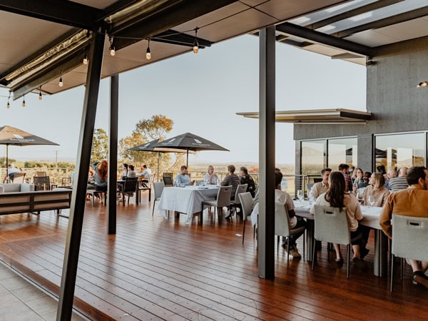 Patrons dining on the deck at 1309 Balgownie Estate