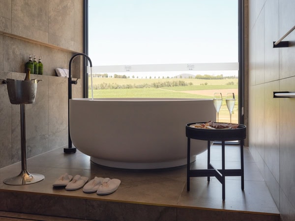 a bathtub with views of the vineyard at Re’em, Yarra Valley